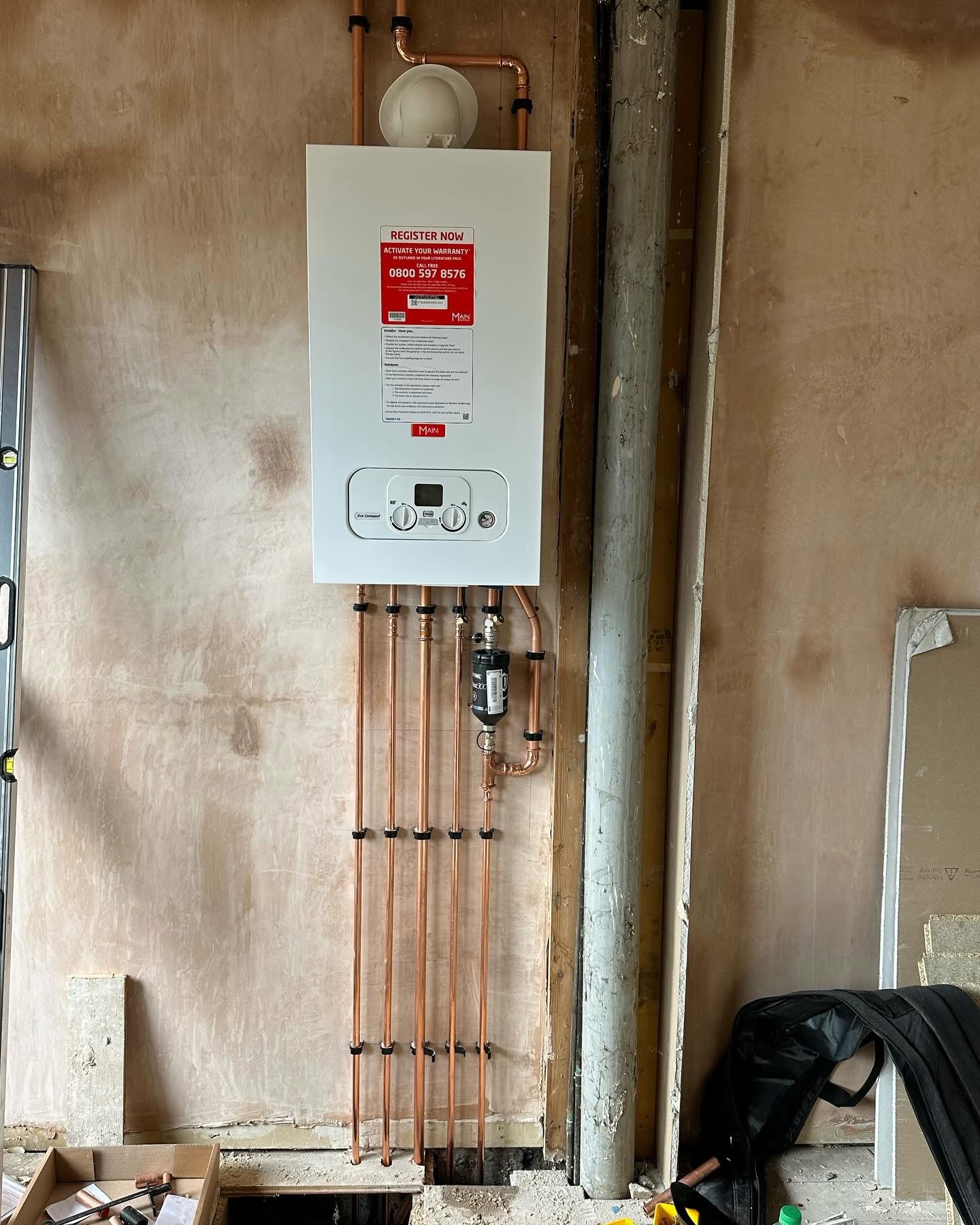 Newly fitted combi boiler with copper pipework